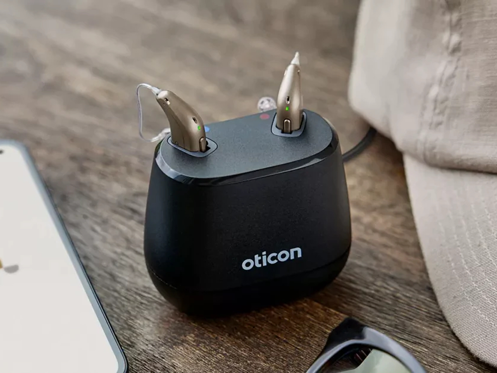 Rechargeable hearing aids in an overnight charger, an alternative to disposable batteries in Falconer, NY