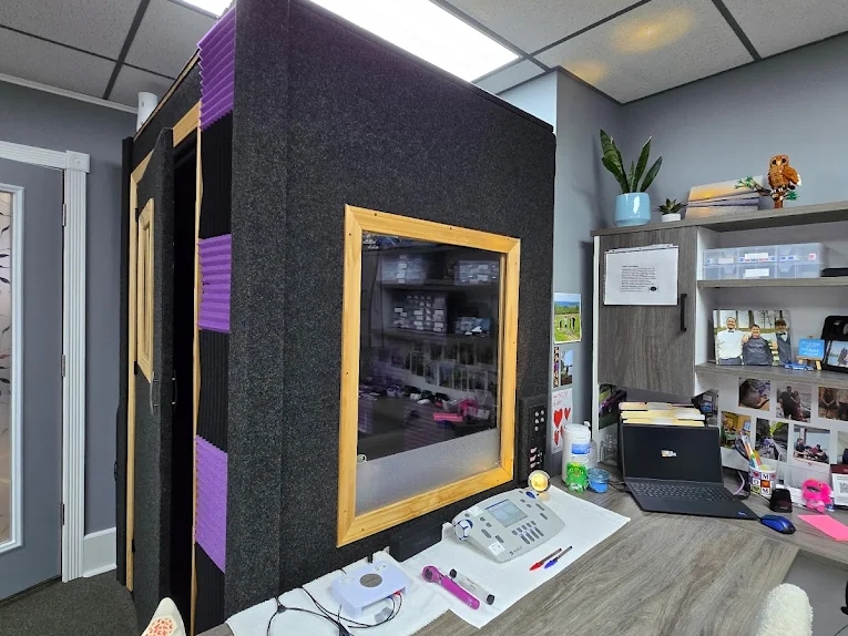 Sound-treated testing booth and audiometric equipment at The Hearing Place, an independent hearing center in Falconer, NY