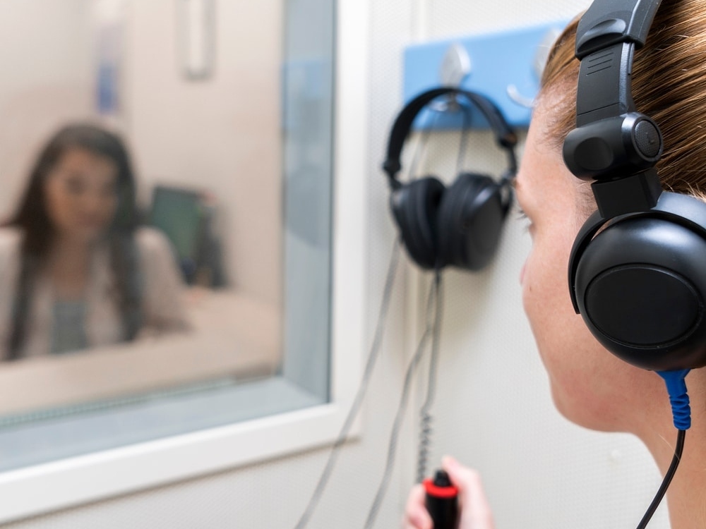 Patient having a hearing evaluation with speech audiometry at The Hearing Place in Falconer, NY