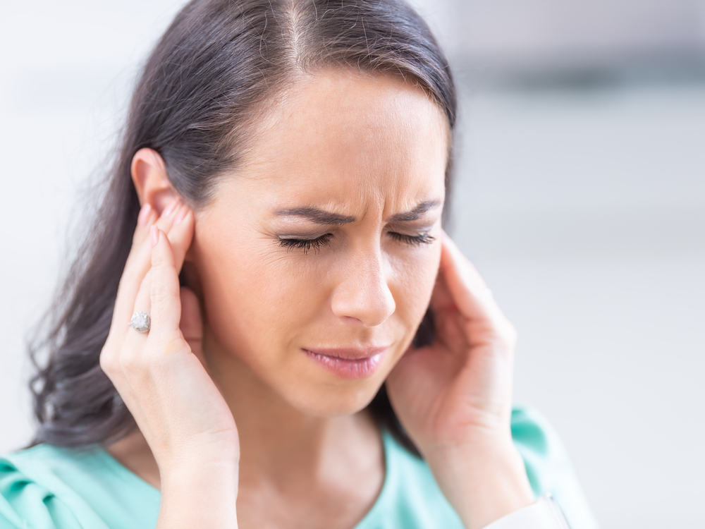 Patient being evaluated for tinnitus and ringing in the ears at The Hearing Place in Falconer, NY